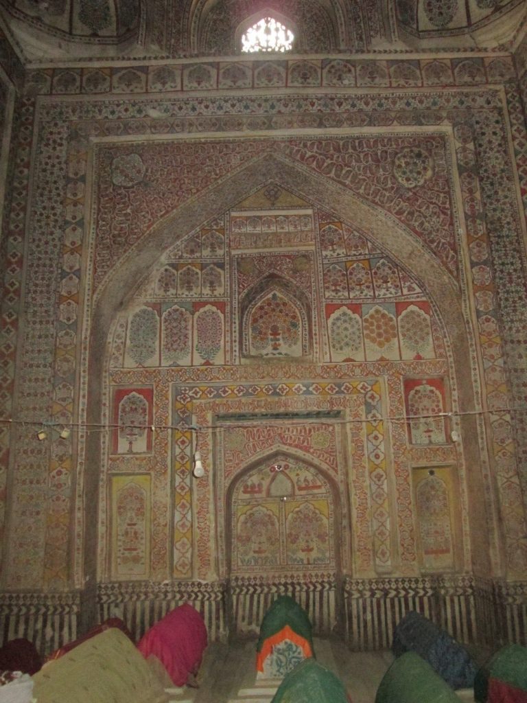 Interior view from tomb (structure for male burials) with floral frescos